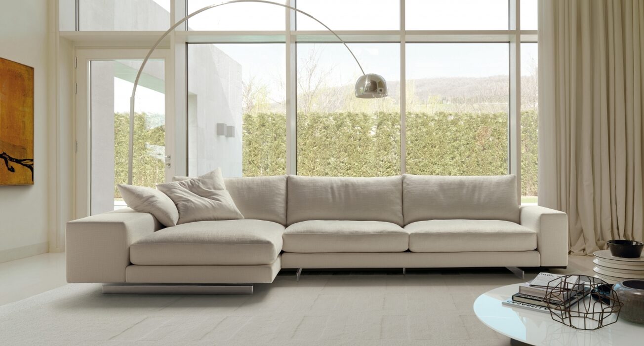 This is a cream fabric modular sofa