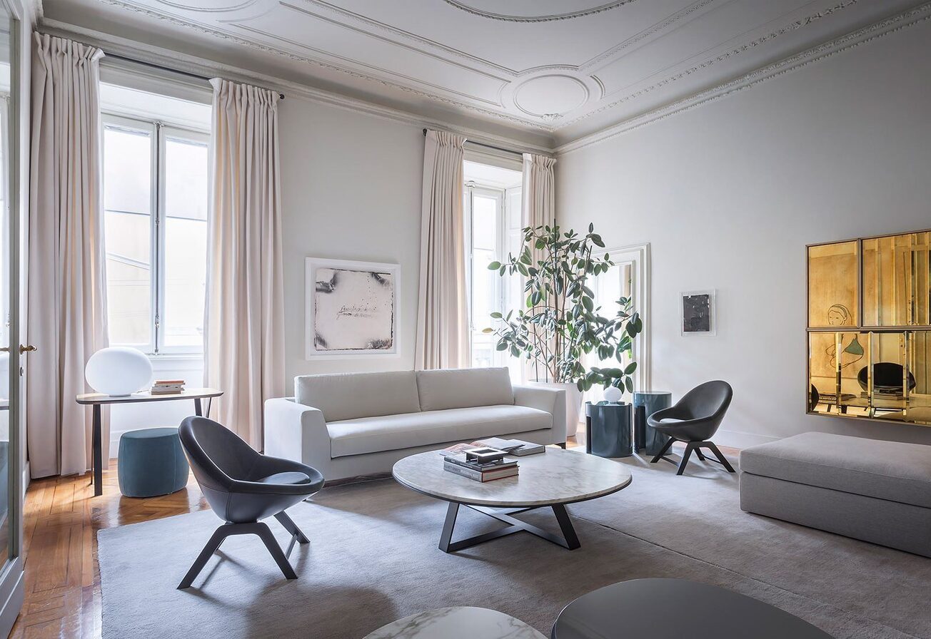 white sofa in white room